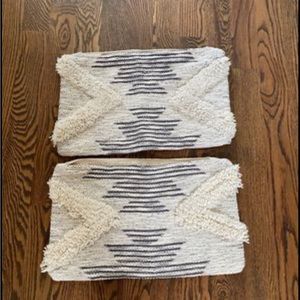 Purchased and never used.  Set of west elm lumbar pillow covers.  12w x 21l.